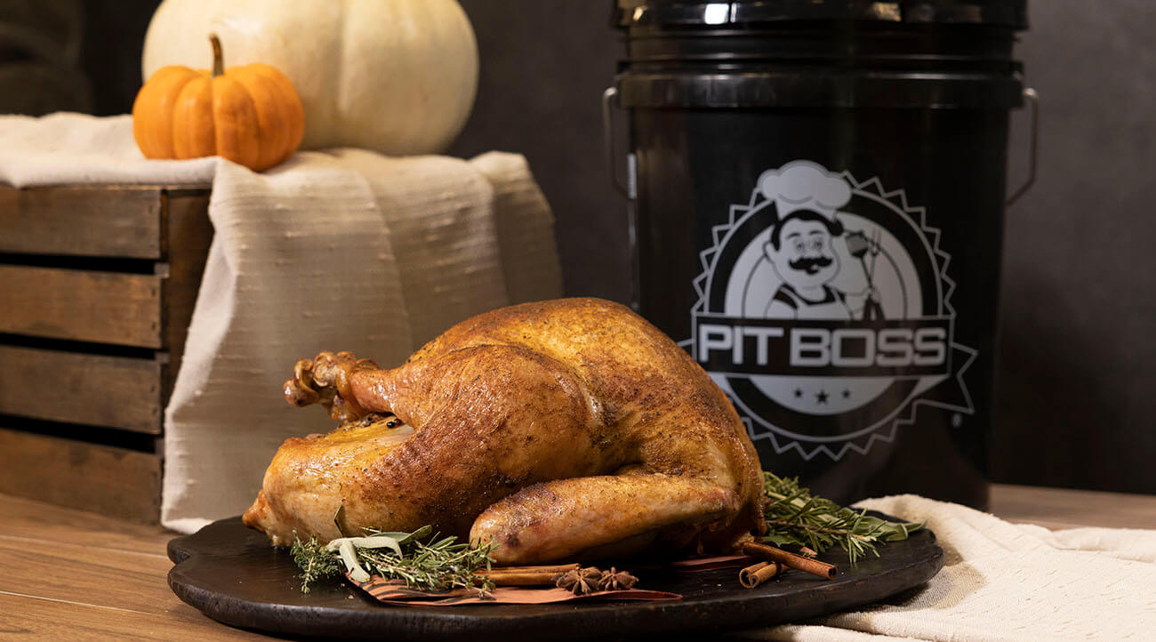 Smoked Holiday Turkey cooked on Pit Boss with Turkey Bucket Kit on Holiday Table