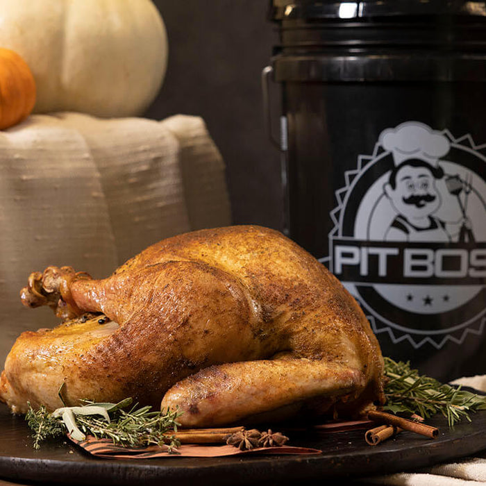 Smoked Holiday Turkey cooked on Pit Boss with Turkey Bucket Kit on Holiday Table