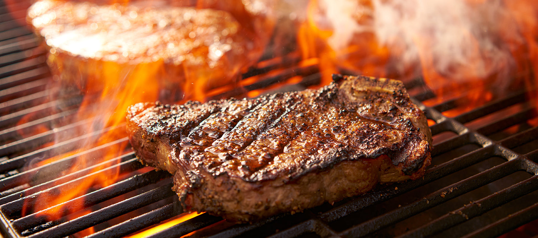 What are the benefits of using a pellet grill over a gas grill?