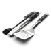 Silver Pit Boss BBQ tools set with black handles and brush.