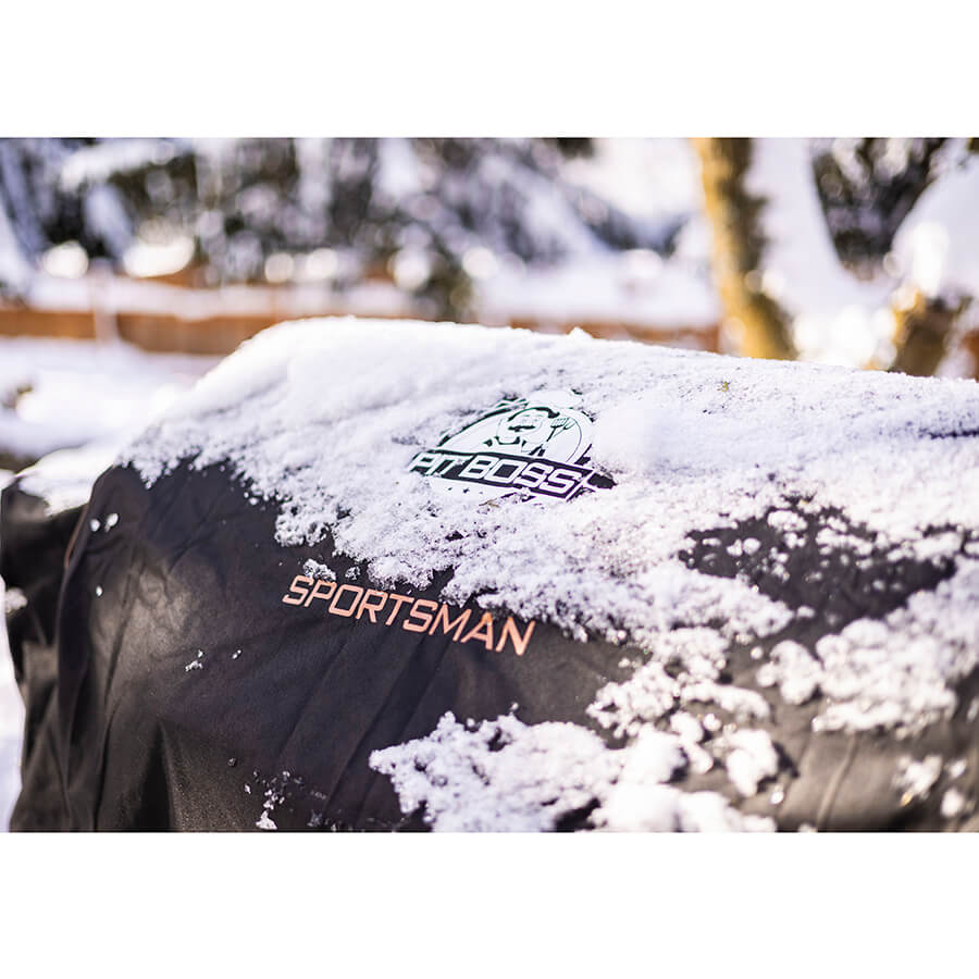 Black "Sportsman" jacket with "AT BOSS" logo, covered in snow.