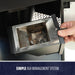 "Stainless steel ash management system with easy access door for efficient cleaning."