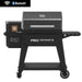 Black Pro Series pellet grill with Bluetooth connectivity and wheels.