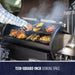 Black grill with 1130-square-inch cooking space, cooking chicken, corn, vegetables, and meat.