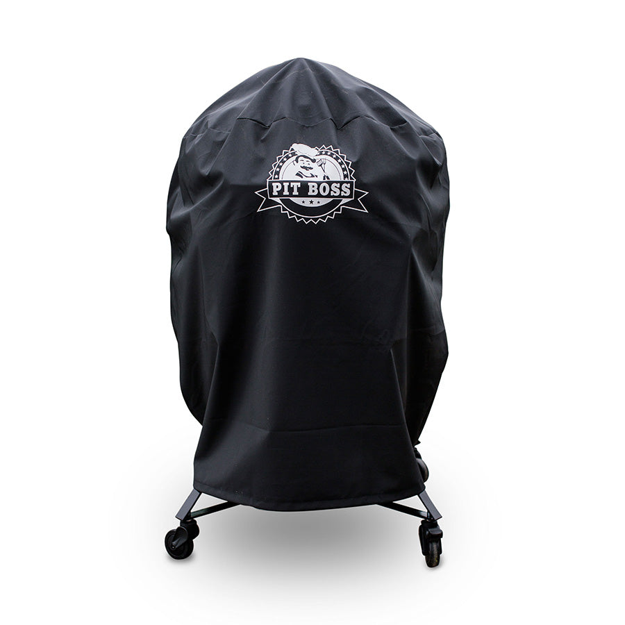 Black Pit Boss grill cover on wheeled stand.