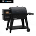 Pit Boss Navigator 850 Wood Pellet Grill with Wi-Fi, black and grey grill with wheels and hopper viewing window, and shelf. front closed barrel