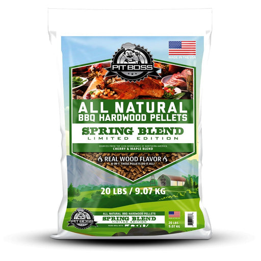 Pit Boss 20 lb Spring Blend Hardwood Pellets. Grass field background. Green and white font. Large Pit Boss logo