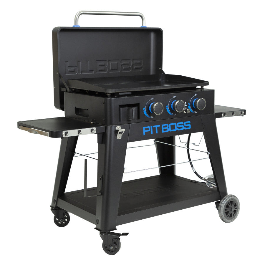 lifestyle_5, Black griddle with bright blue and silver accents with large Pit Boss logo in blue on front. Side angle view. Griddle hood open