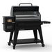 Pit Boss Navigator 1600 Wood Pellet Grill, black and grey grill, side angle with barrel open to reveal cooking grids