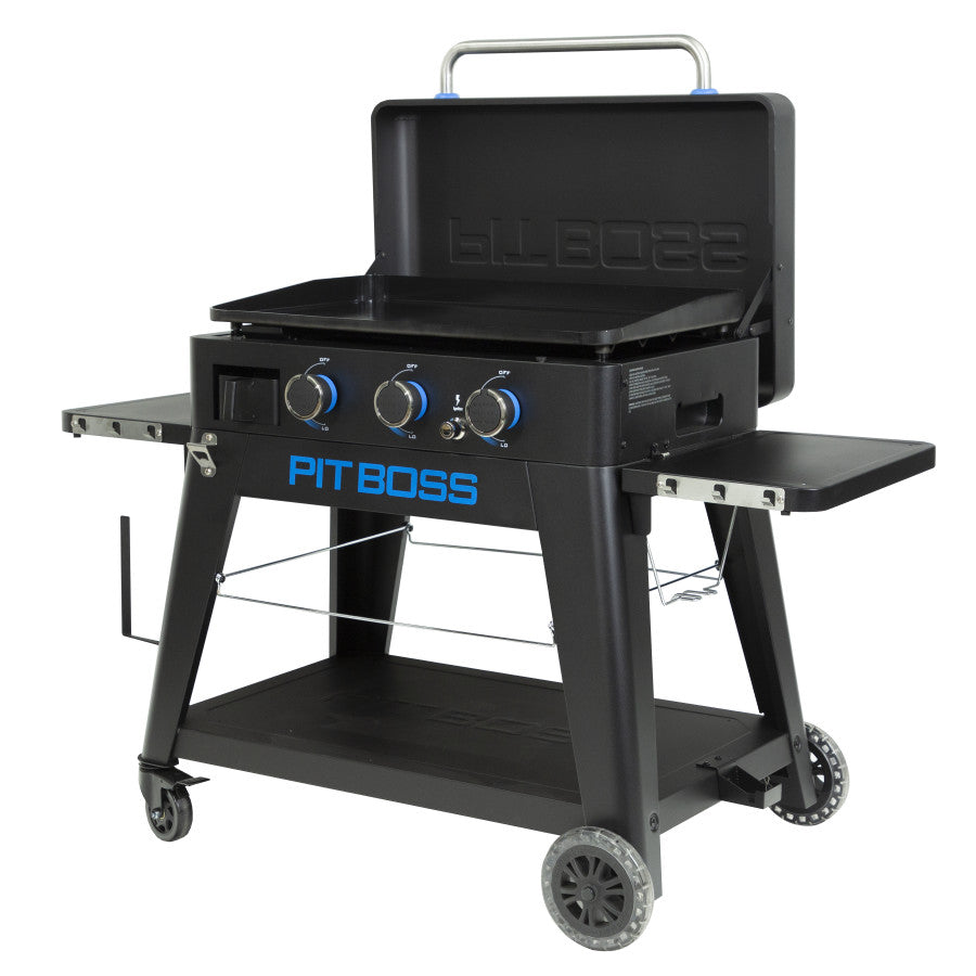 lifestyle_3, Black griddle with bright blue and silver accents with large Pit Boss logo in blue on front. Side angle view. Grill hood open