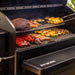pit boss heritage wood pellet grill, grilling and smoking meats and veggies on cooking grates