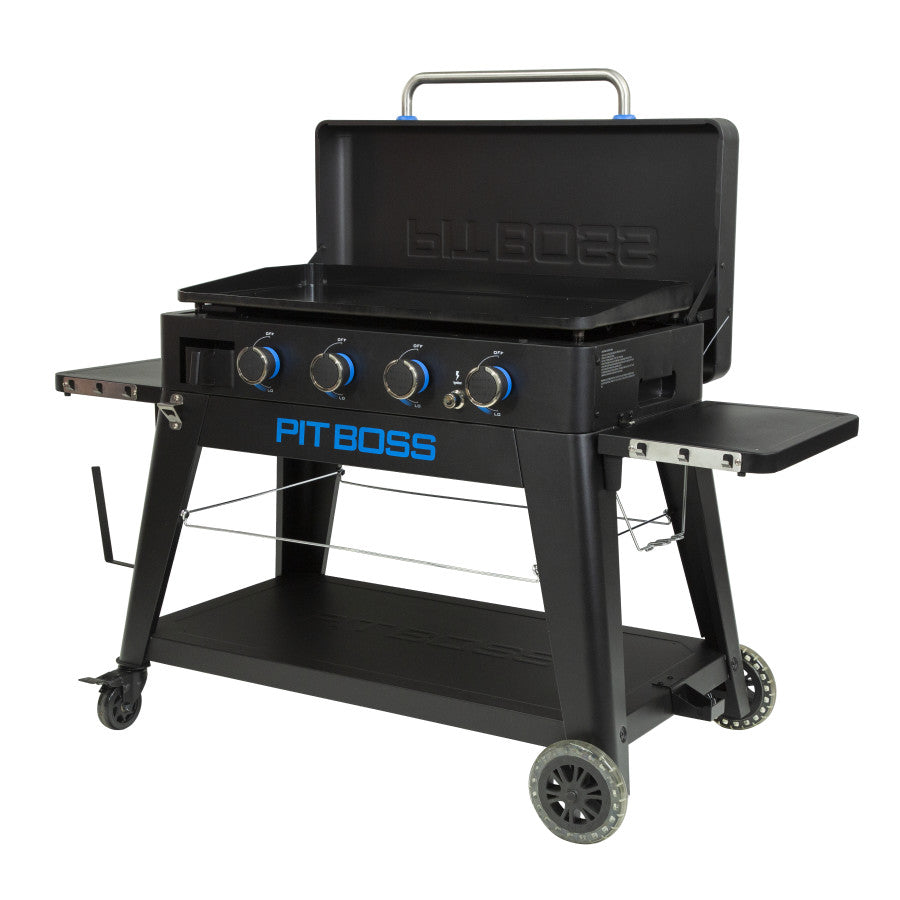 lifestyle_3, Black griddle with bright blue and silver accents and a large blue Pit Boss logo on front. Side angle view. Grill hood open