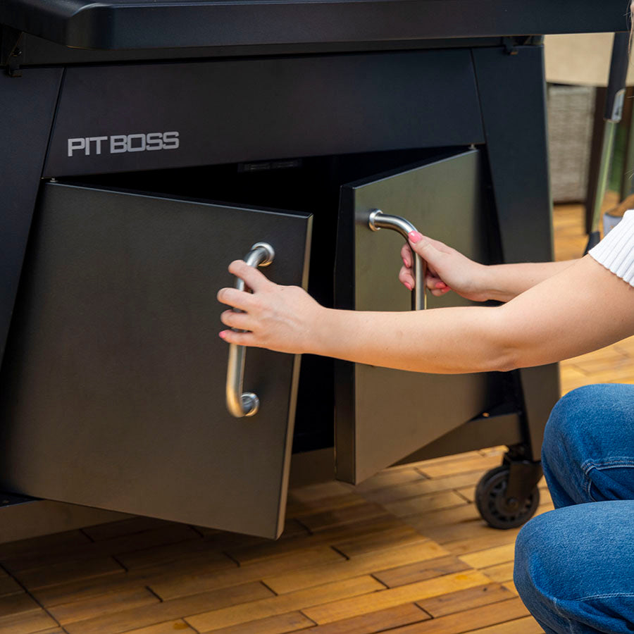pit boss heritage wood pellet grill, opening bottom cabinet storage doors