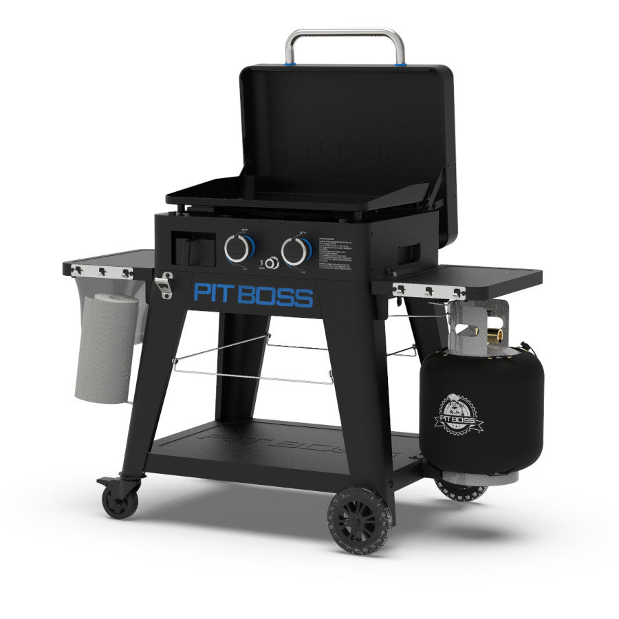 lifestyle_3, Black griddle with blue and silver accents. Large blue "Pit Boss" logo across front.  Top griddle portion shown 'lifted-off' the cart for portable function