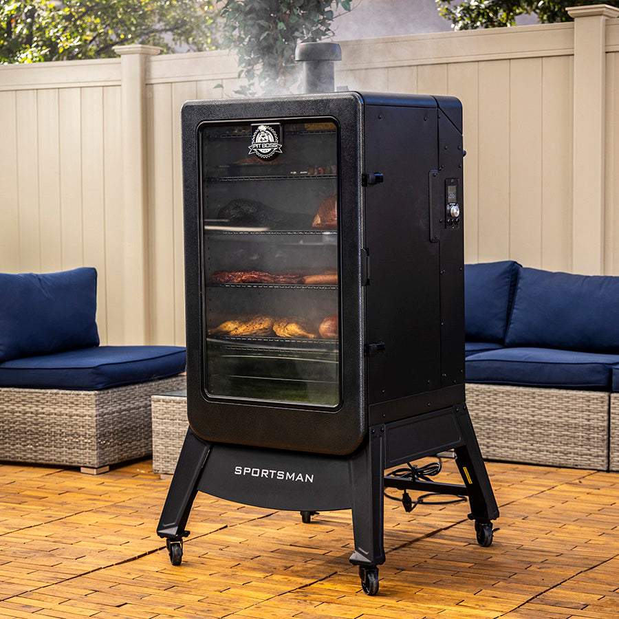 Pit Boss Sportsman 7-Series Vertical Wood Pellet Smoker on backyard patio with food smoking inside