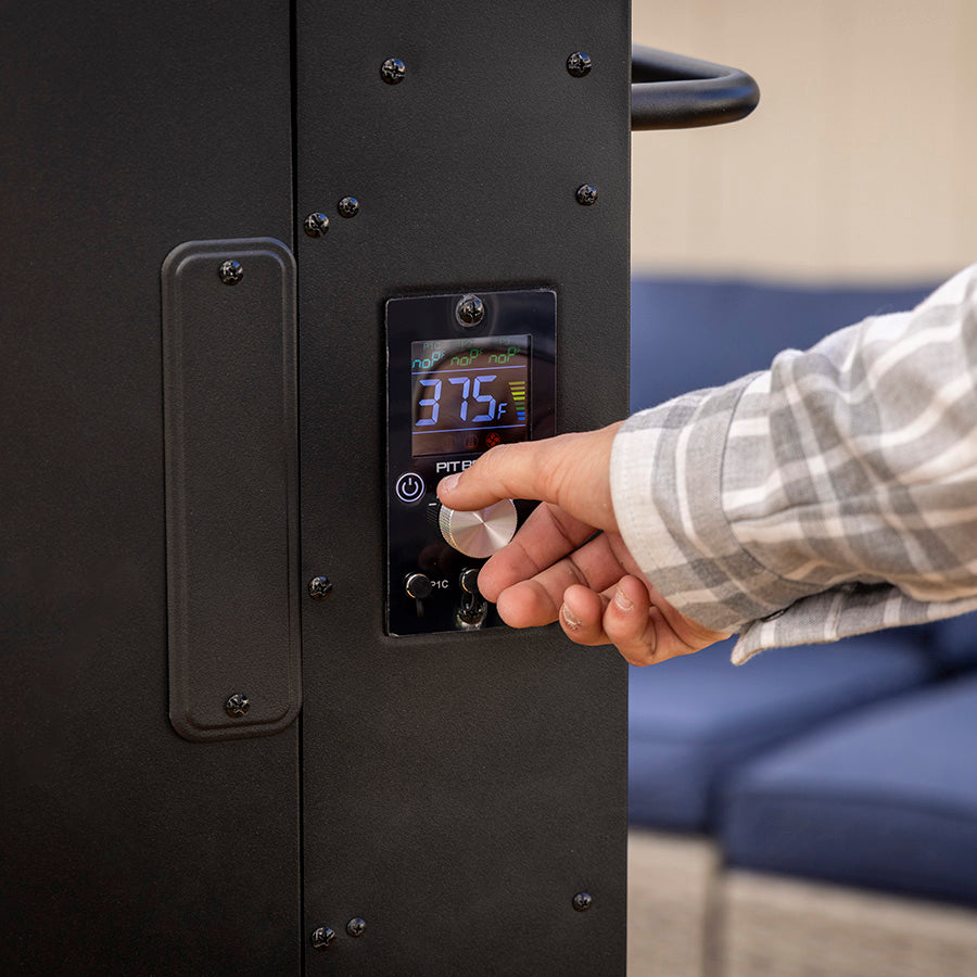 Pit Boss Sportsman 7-Series Vertical Wood Pellet Smoker, hand setting temperature on digital control board