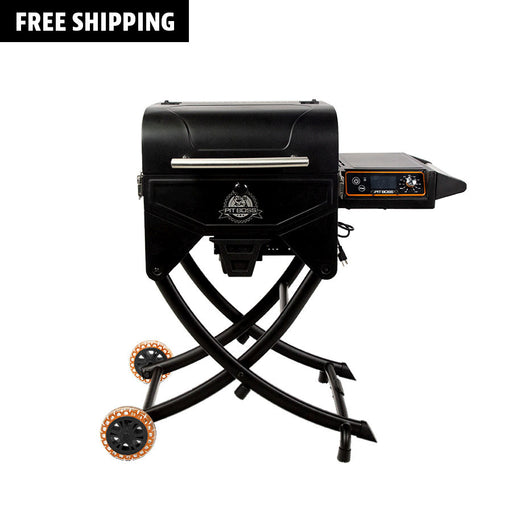 Pit Boss Sportsman Portable Wood Pellet Grill. Black with orange accents. Side table out.
