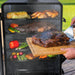 Pit Boss Navigator 3 Series Vertical Smoker, removing smoked brisket from smoker with other grilled meats and veggies