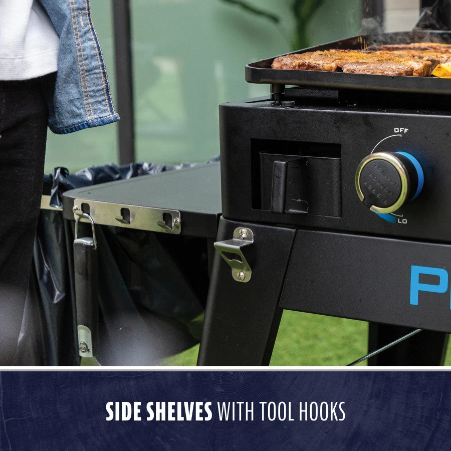 Black Pit Boss Grills 4-Burner Ultimate Lift-Off Griddle with side shelves and tool hooks.