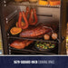 Pit Boss Grills Competition Series PBV5P2 Vertical Smoker with 1679-square-inch cooking space, featuring meats, vegetables.