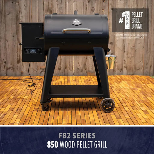 Black Pit Boss Grills FB2 Series 850 Wood Pellet Grill with digital control panel and wheels.