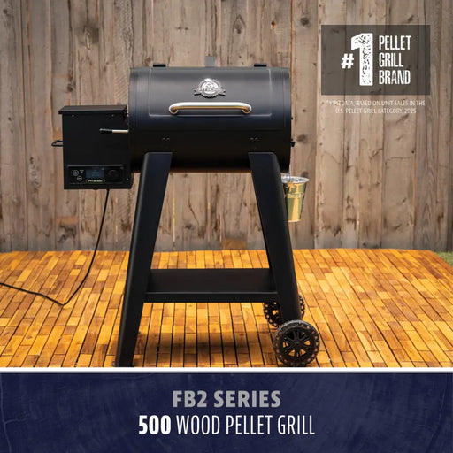 Black Pit Boss Grills FB2 Series 500 Wood Pellet Grill on wheels, ready for outdoor cooking.