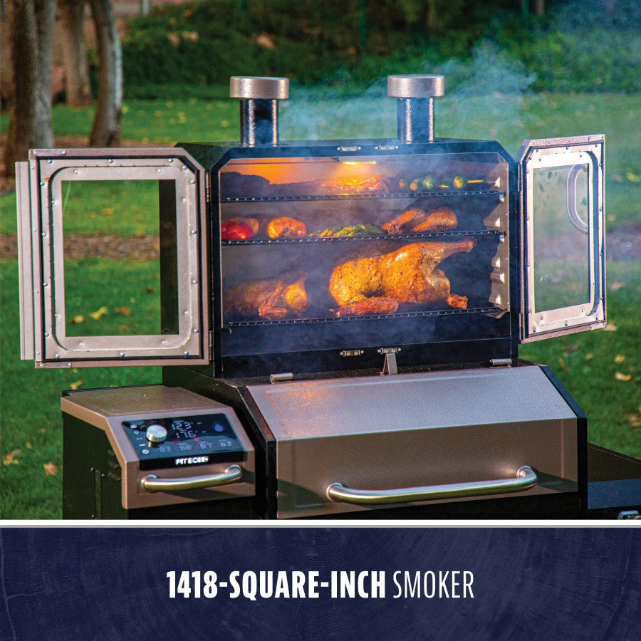 Smpoker doors open shown with meats and veggies on all three levels of the grilling rack. Grill located in a backyard.