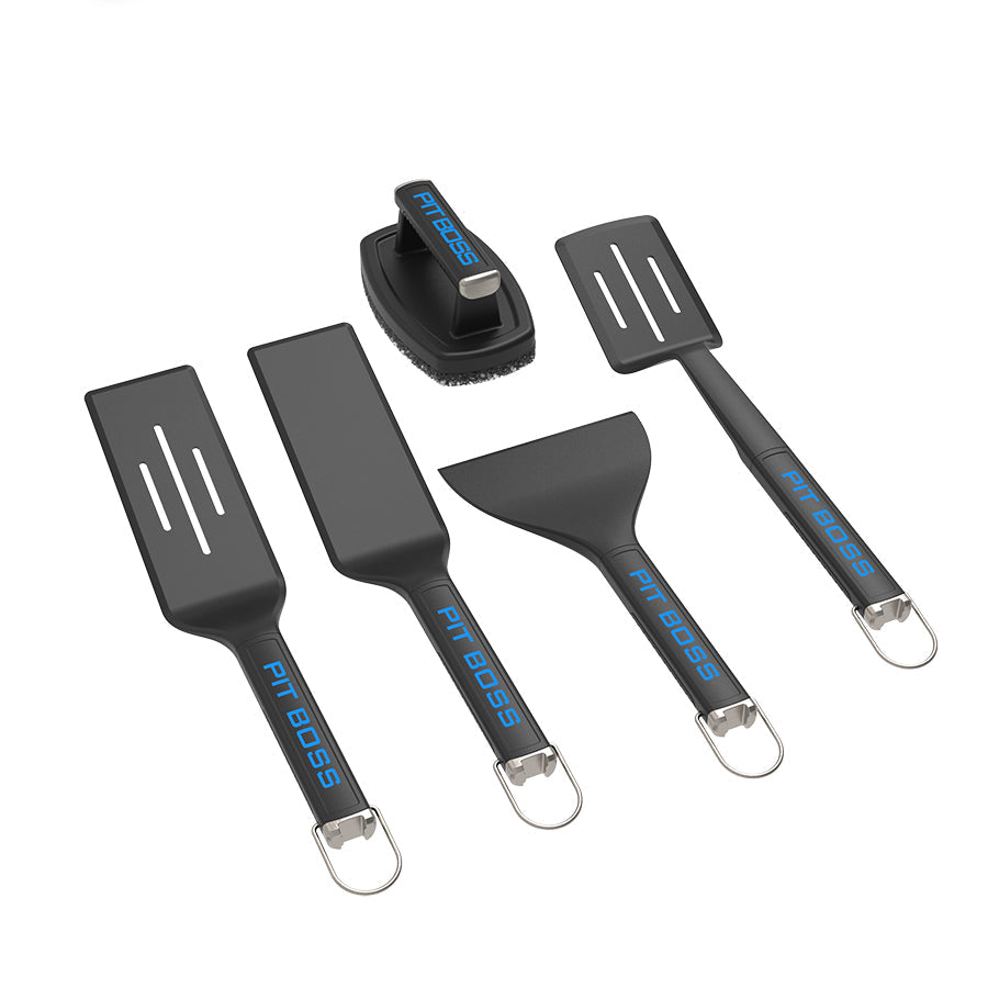 Pit Boss Ultimate Griddle Kit 5-Piece. All black tools with blue Pit Boss name of the front of all tools.