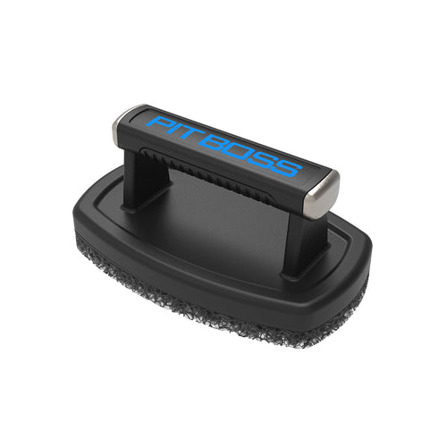 Black PitBoss cleaning brush with textured scrubbing surface.