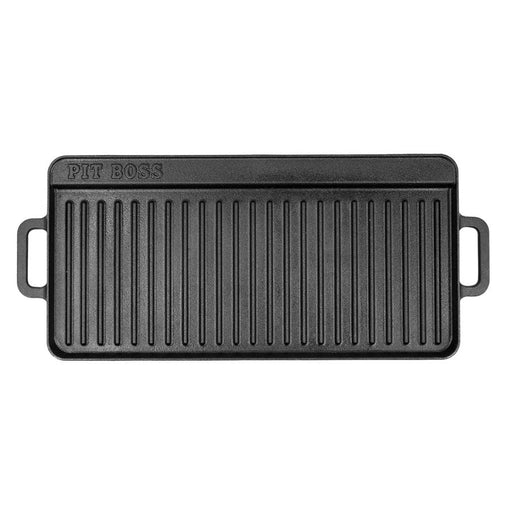 Black Pit Boss cast iron griddle with handles.