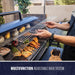 Blue grill with multifunction adjustable rack system, cooking assorted foods.