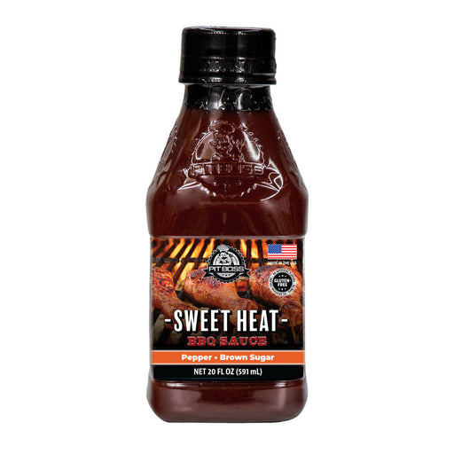 Dark brown Fit Boss Sweet Heat BBQ Sauce bottle, 20 fl oz (591 mL), with pepper and brown sugar flavors.
