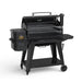 Black Pit Boss Pro Series pellet grill with digital control panel and two cooking grates.
