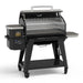 Black PRO 500S pellet grill with digital control panel and three cooking grates.