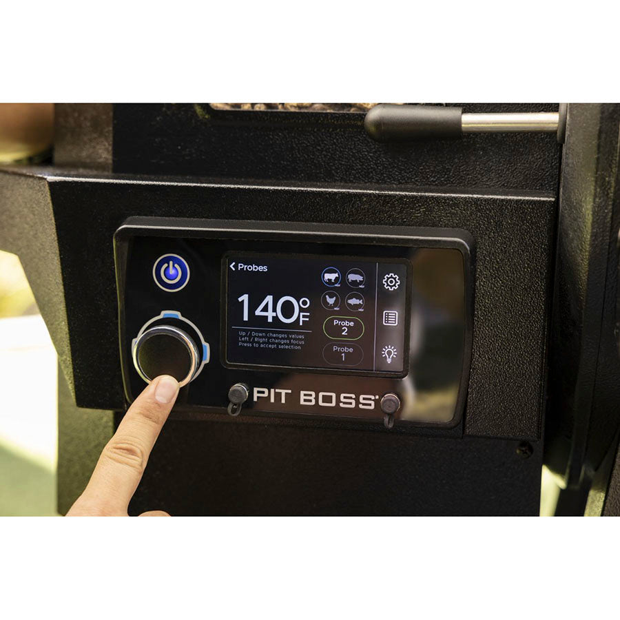 Black Pit Boss digital smoker control panel displaying 140°F with probe settings.