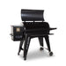 Black Pit Boss pellet grill with control panel and wheels.