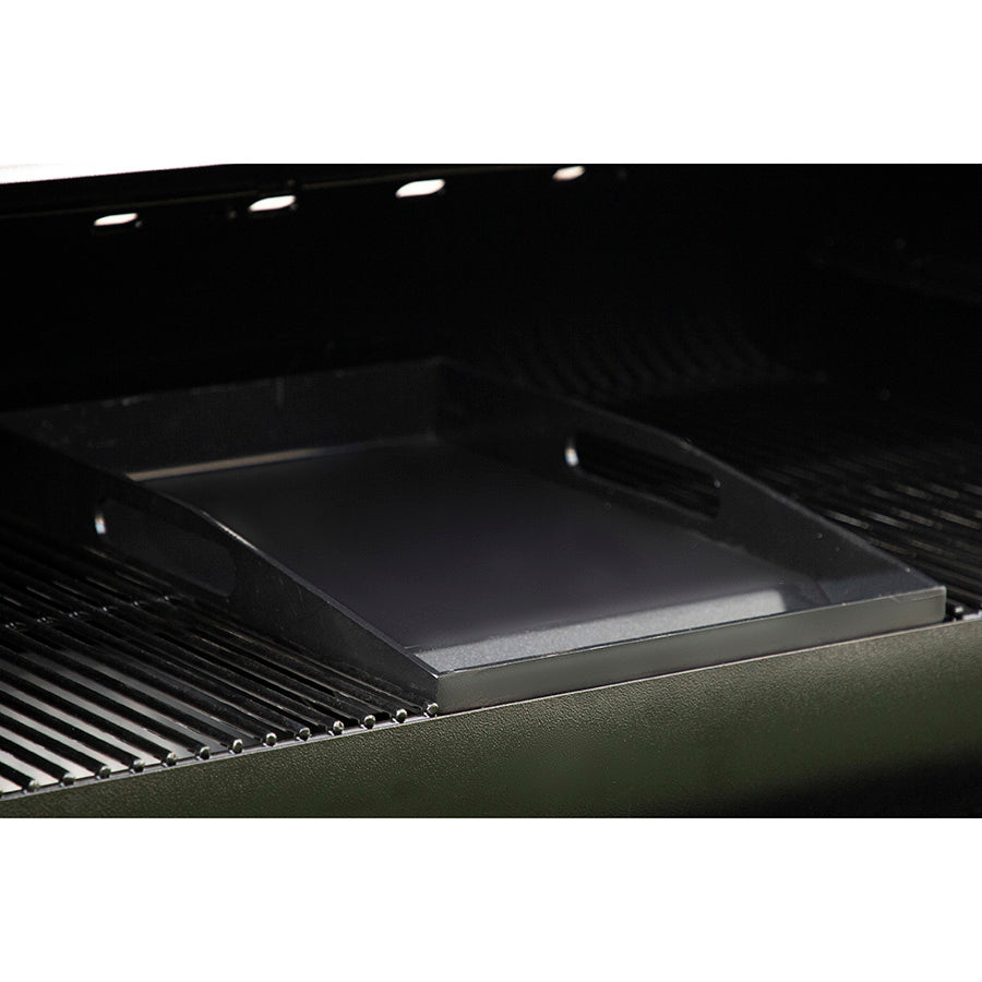 Black grill accessory tray for outdoor cooking.