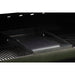 Black grill accessory tray for outdoor cooking.
