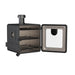 Black outdoor wood-fired oven with three racks and chimney.