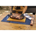Brown Boss BBQ Pit Cloth on wooden cutting board with knife and blue towel.