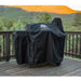 Black grill cover with "Pro Series" logo on wooden deck with mountain view.