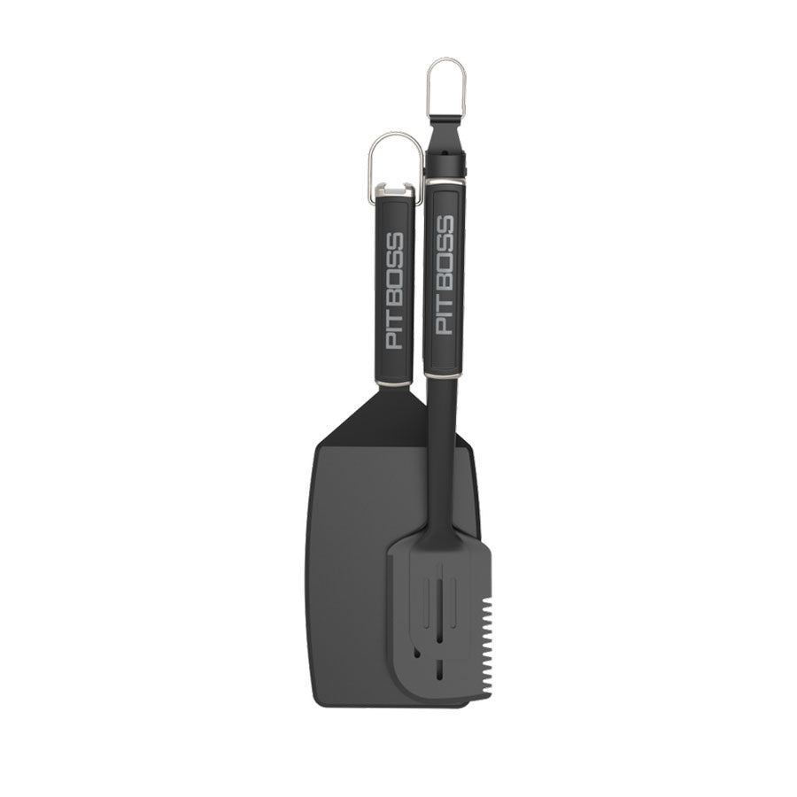 Black Pit Boss BBQ spatula and brush set with hanging loop.