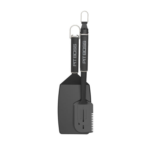 Black Pit Boss BBQ spatula and brush set with hanging loop.