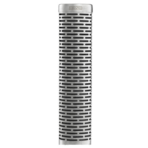 Stainless steel tube smoker with vented design for grilling or smoking food; cylindrical and perforated for airflow.