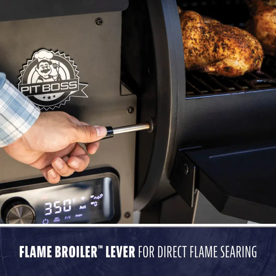 Pit Boss grill with flame broiler lever for direct flame searing.