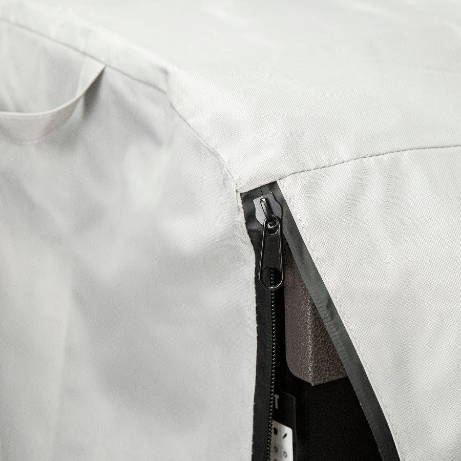 White jacket with black zipper and trim, modern design.