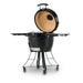 Black kamado-style grill with dome lid and side shelves on a stand with wheels.