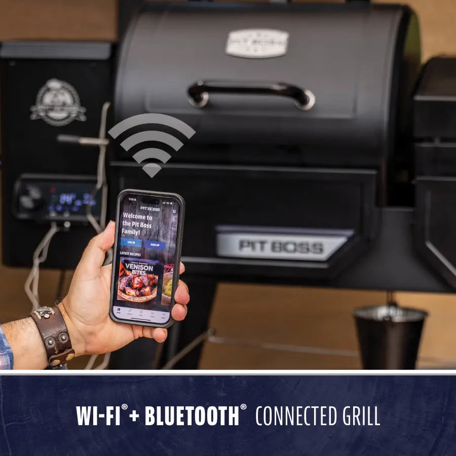 Black Pit Boss connected grill with Wi-Fi and Bluetooth, shown with smartphone app.