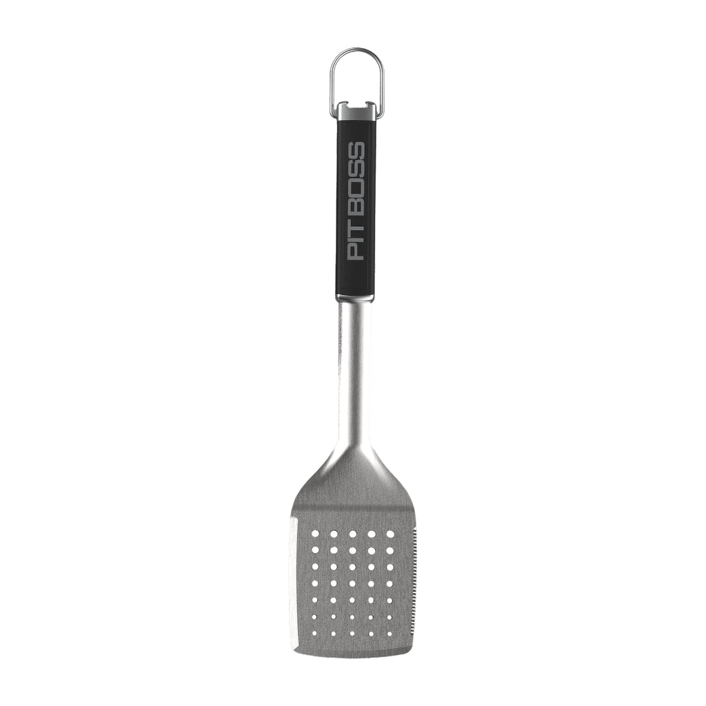 Stainless steel grill spatula with perforated head, serrated edge, and black handle labeled "PIT BOSS."