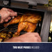Black grill with two meat probes included, cooking a whole chicken.